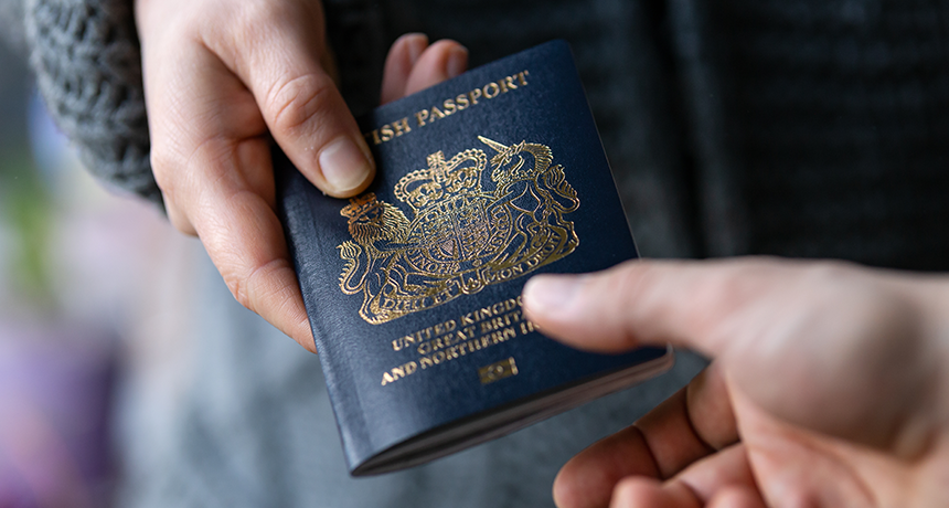 Person handing passport over