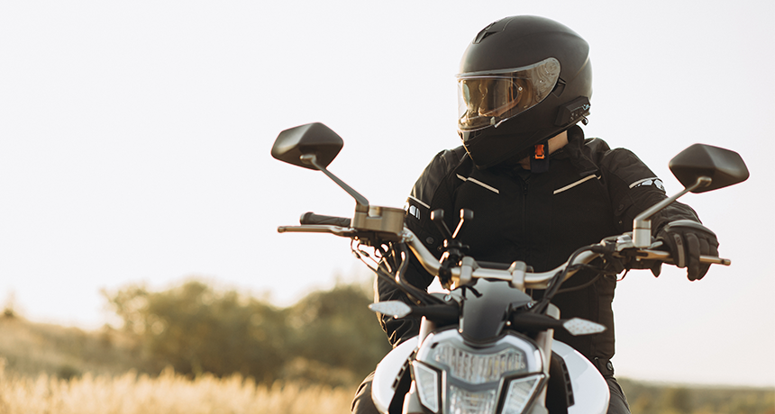 person wearing motorbike helmet.png