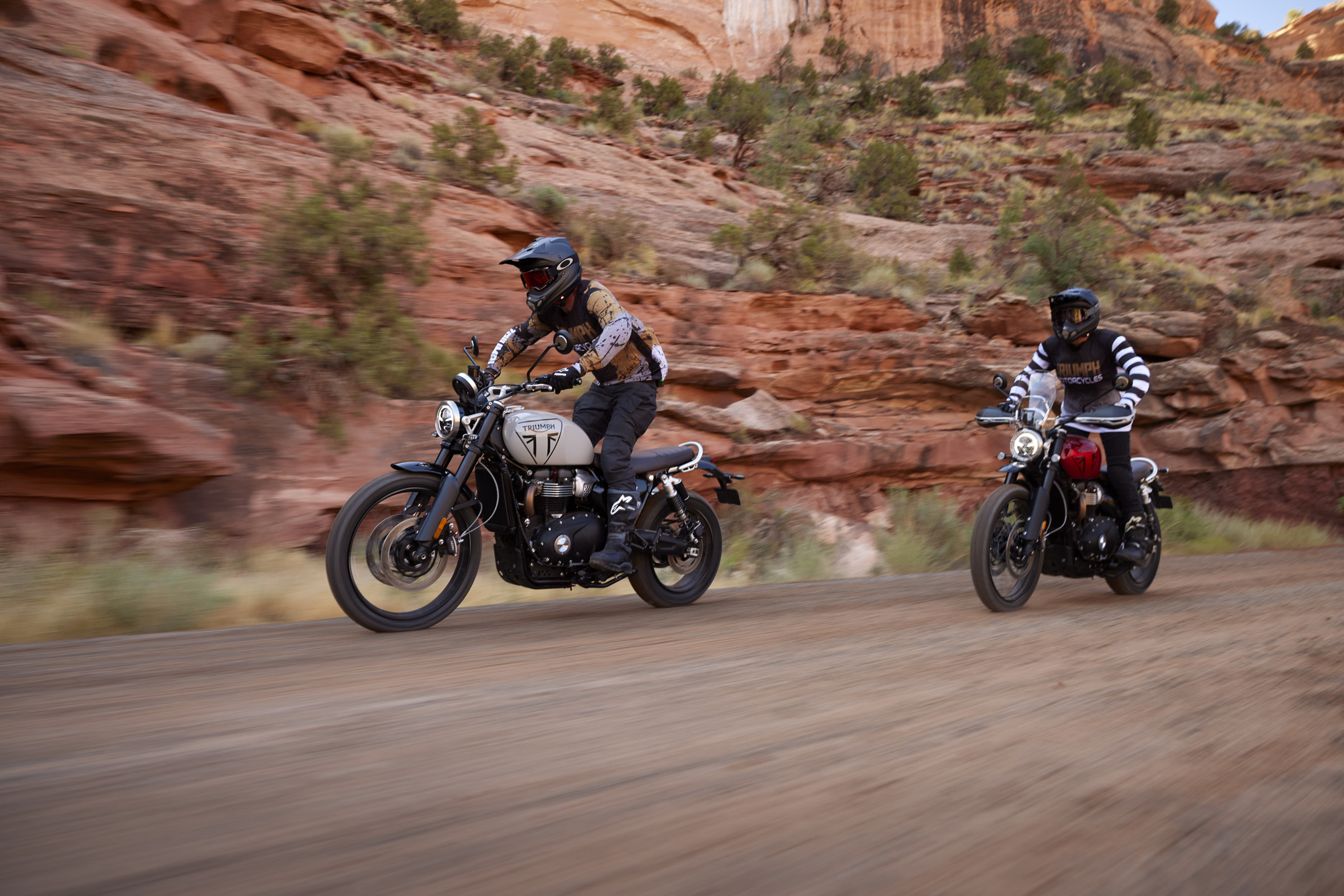 2024 Triumph Scrambler 1200 X ridden on a dusty trail