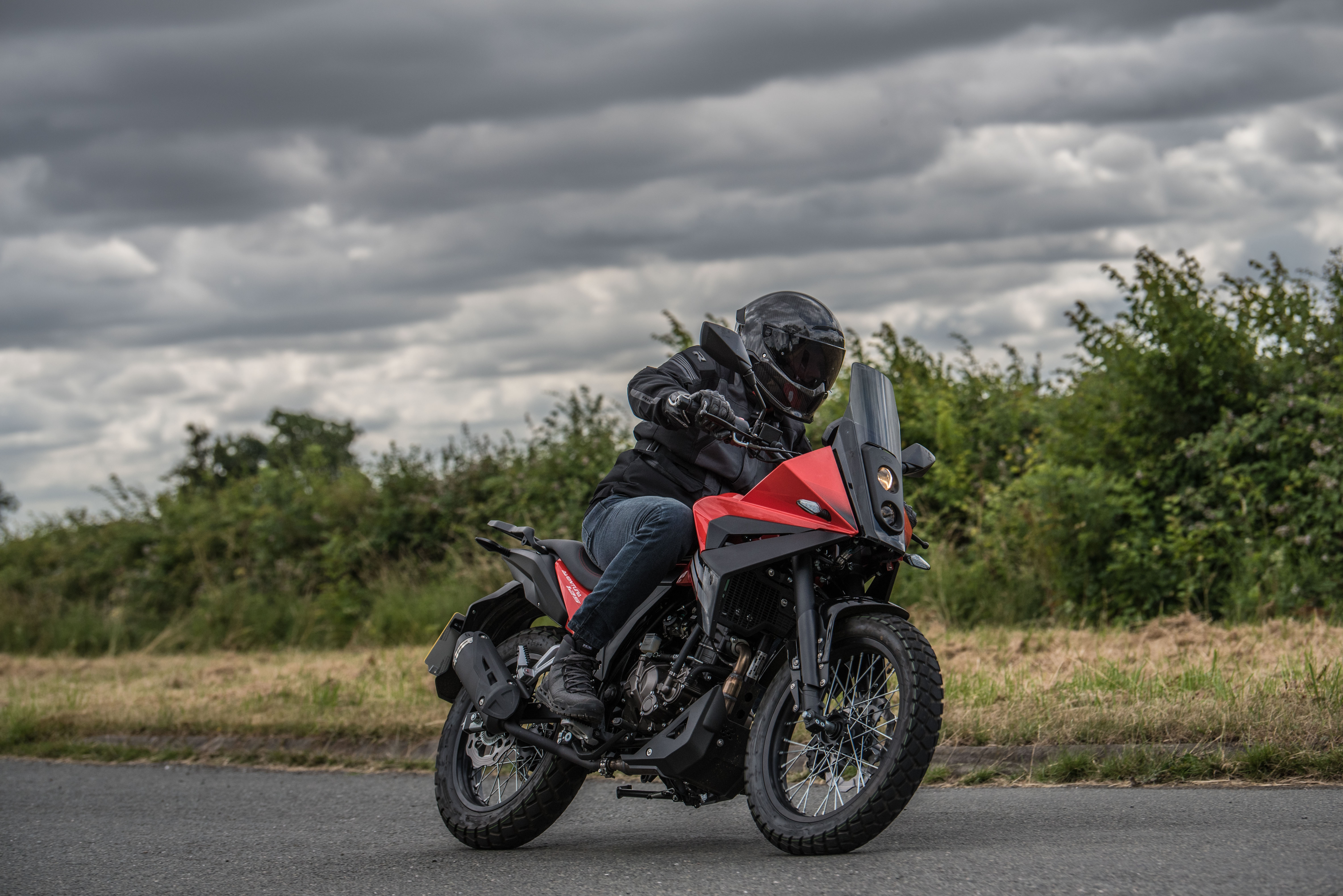 Rieju Aventura 125 with gloomy skies overhead