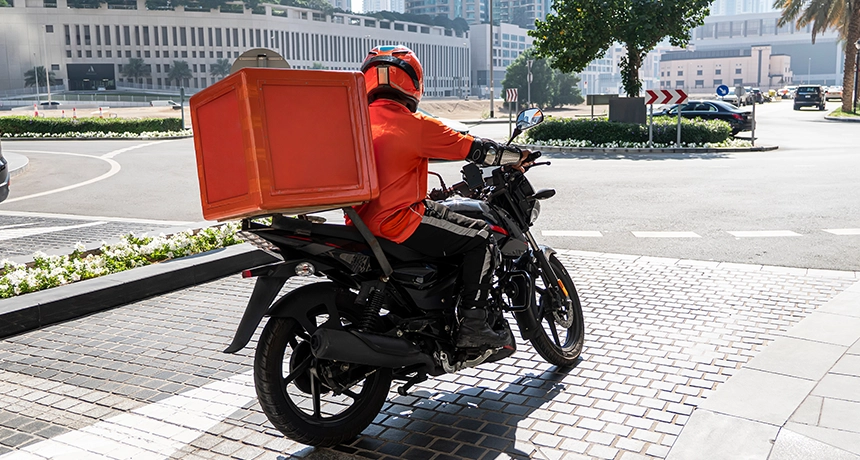 delivery rider on motorbike