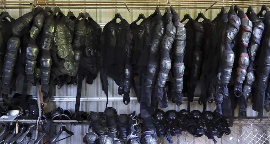 motorcycle gear hanging up.webp