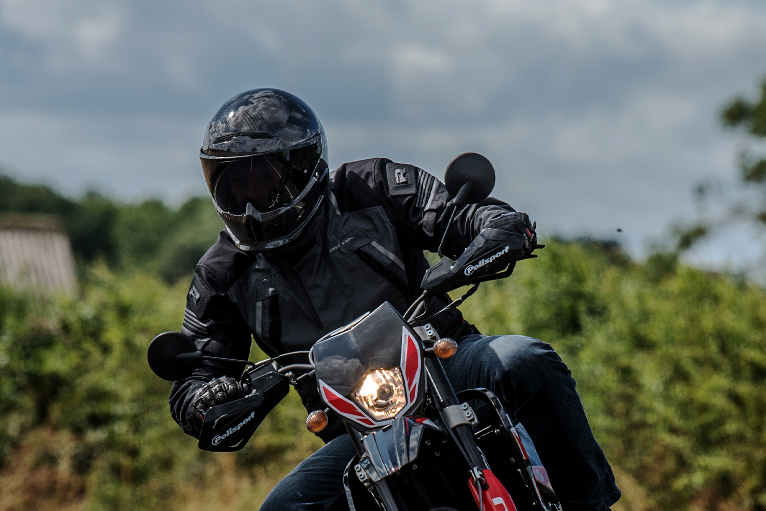 Alex riding with the Ruroc Atlas 4 helmet