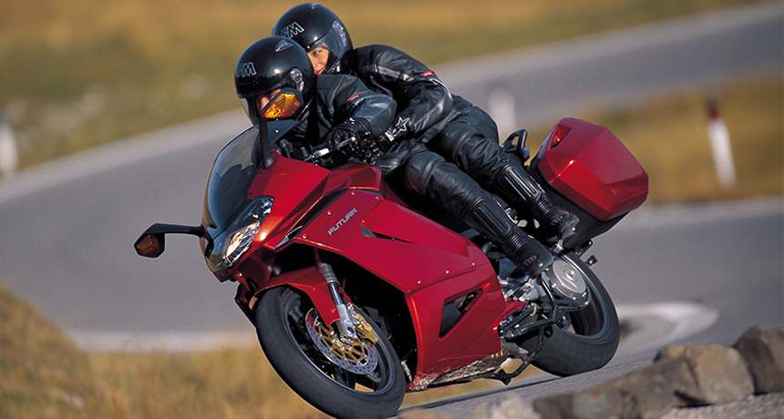 Red Aprilia RST1000 Futura ride on photo