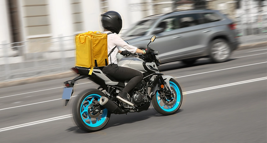 delivery rider on motorbike