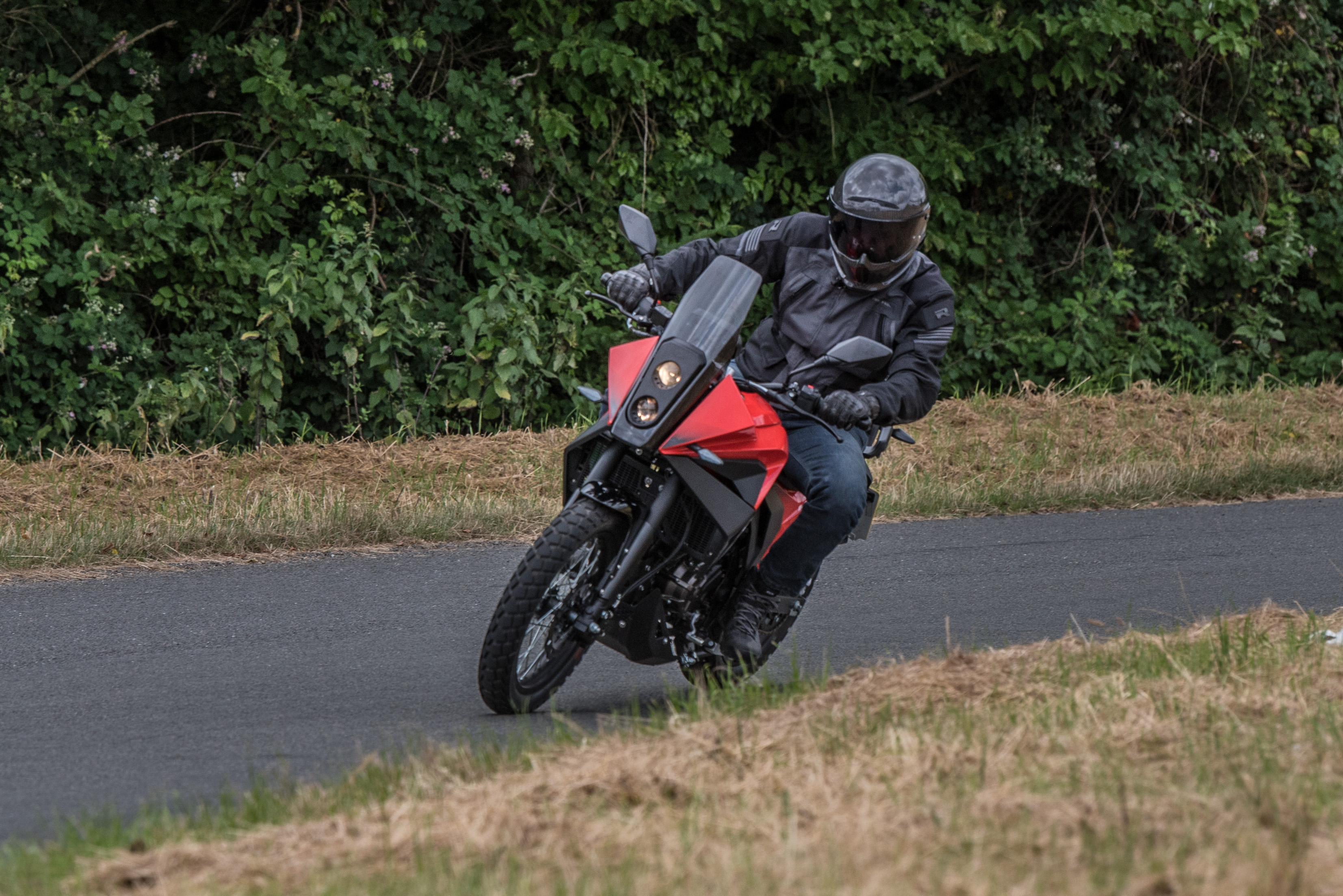 Rieju Aventura 125 wearing a Richa jacket and Ruroc helmet