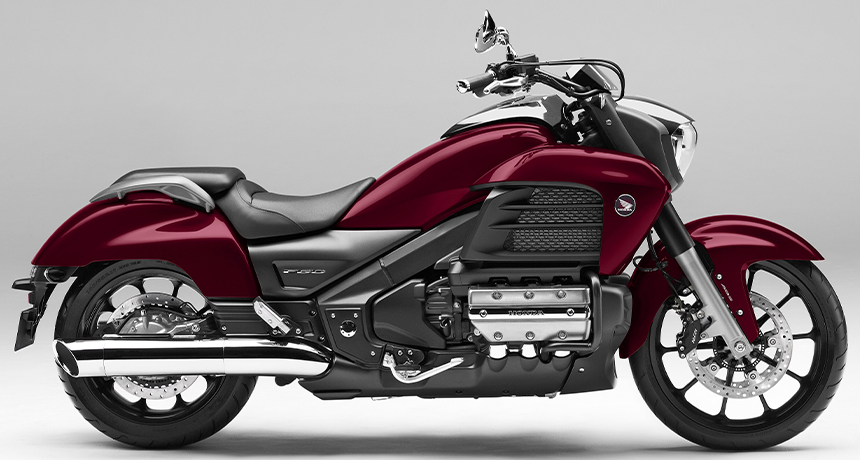 Red and black Honda F6C on gradient background