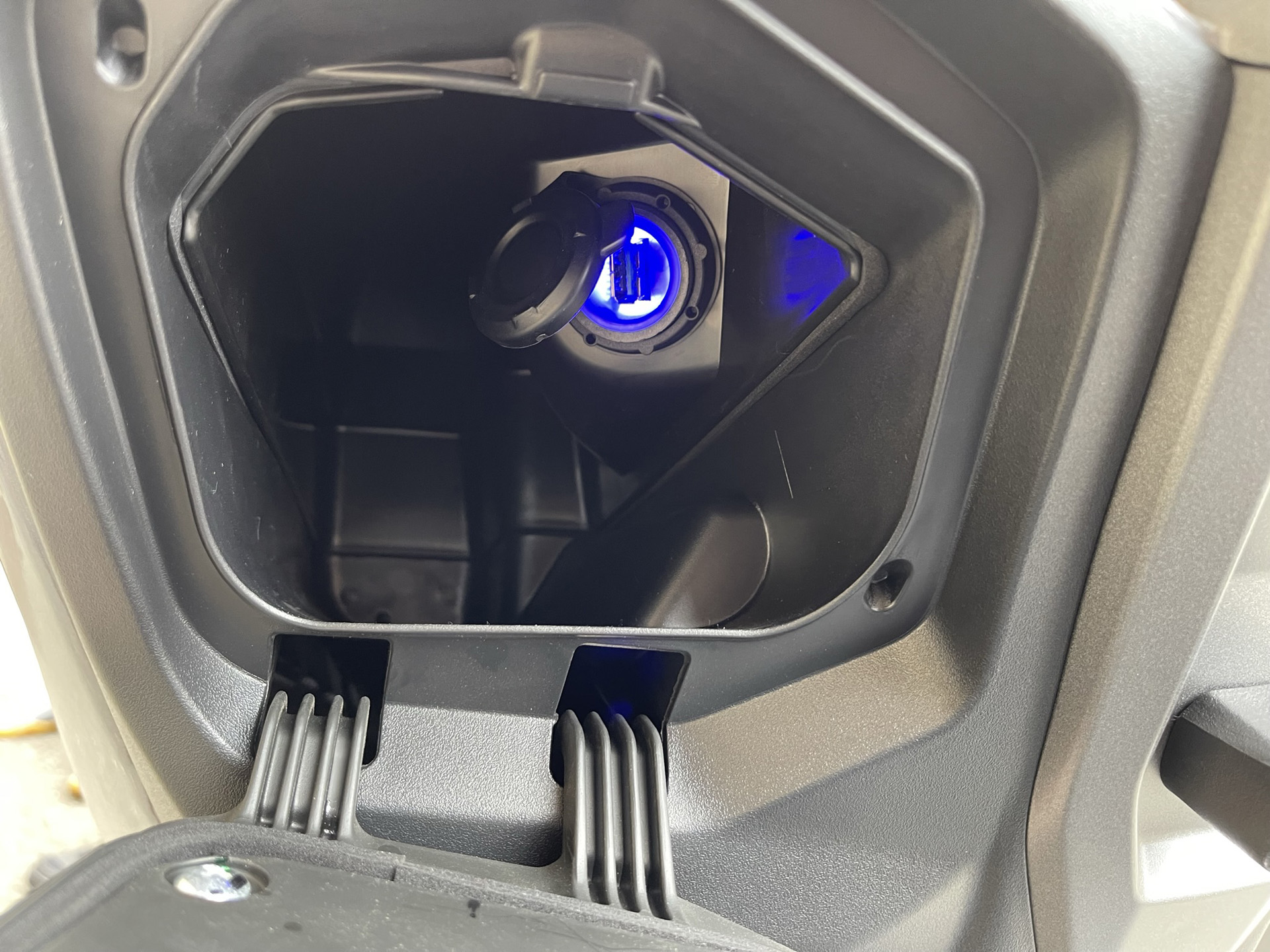 USB-A in the left hand side compartment Suzuki Burgman Street 125EX