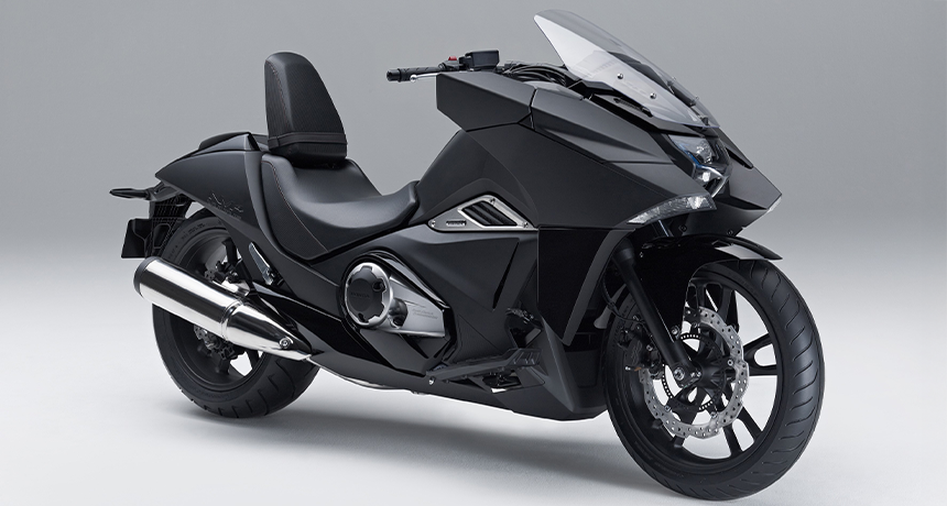 Honda NM4 Vultus black on gradient background