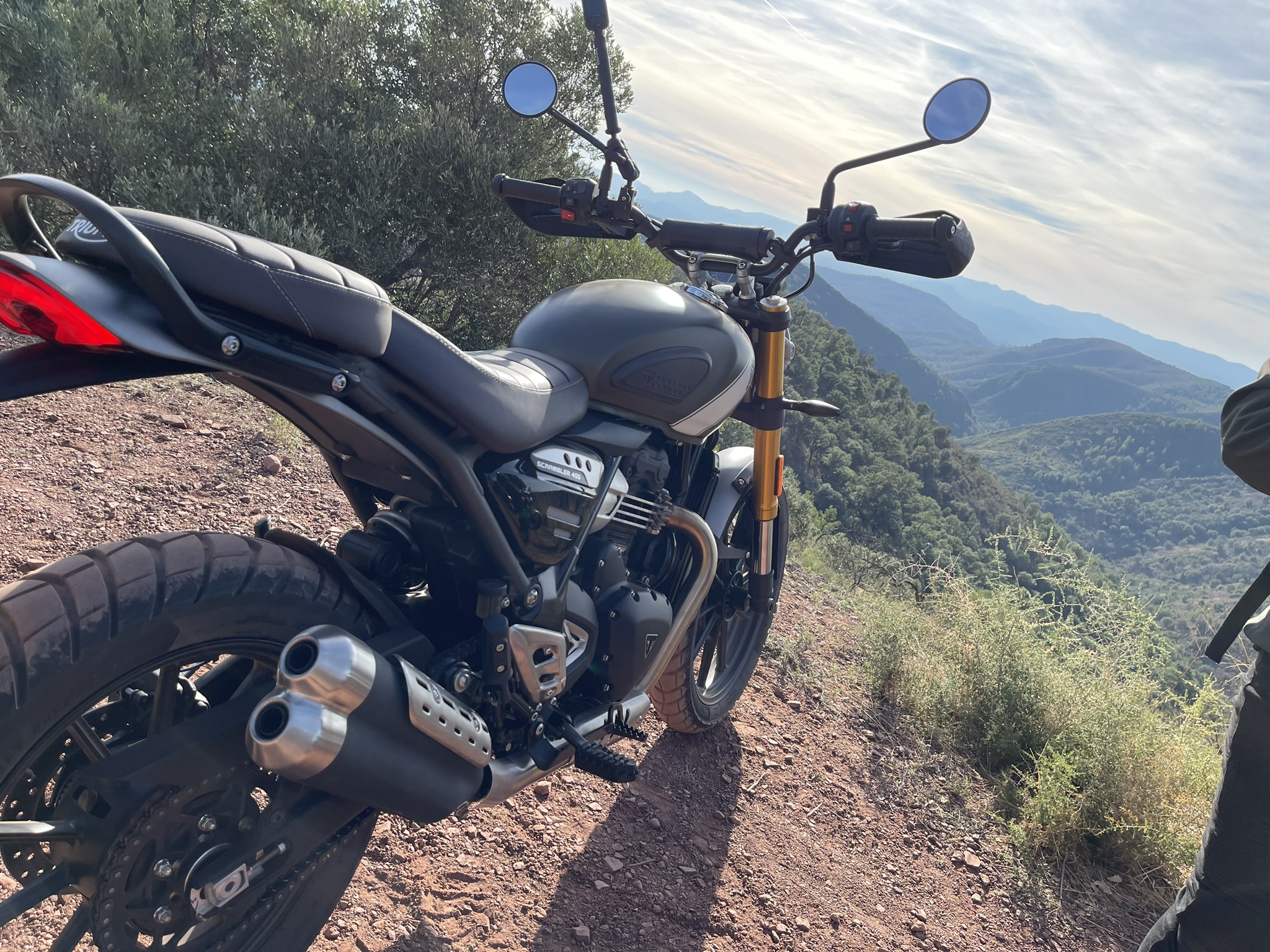 Rear of the Scrambler 400 X overlooking Spanish forest