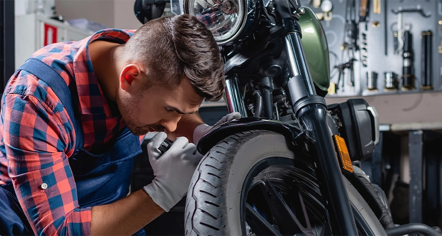 inspecting tyres and brakes.webp
