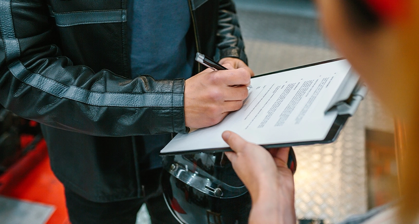 INSURANCE WRITING ON PAPER.webp