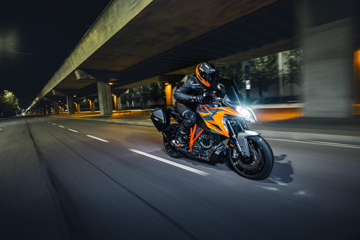 KTM 1290 Super Duke GT on road at night