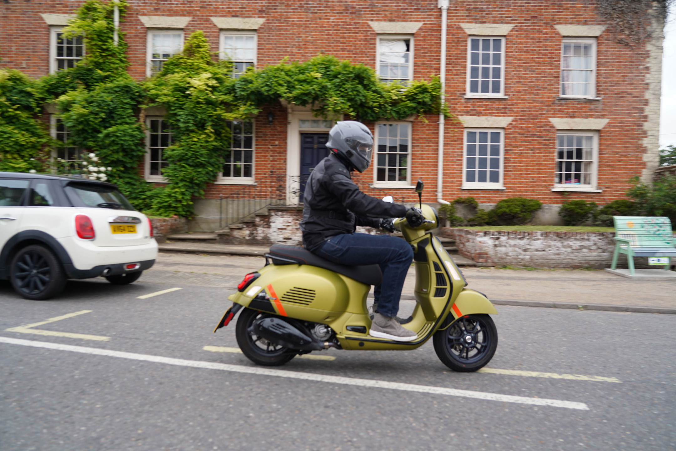 Vespa GTS 300 Super Sport 2023 riding in British town