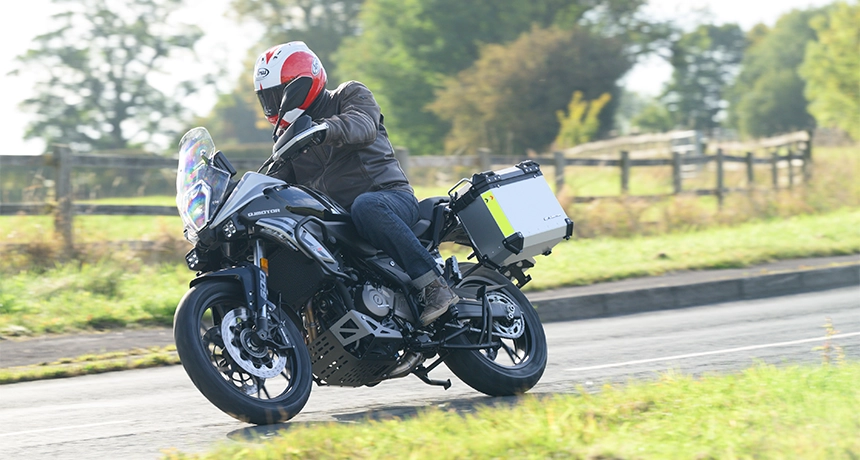 Person rides a QJMotor SRT600