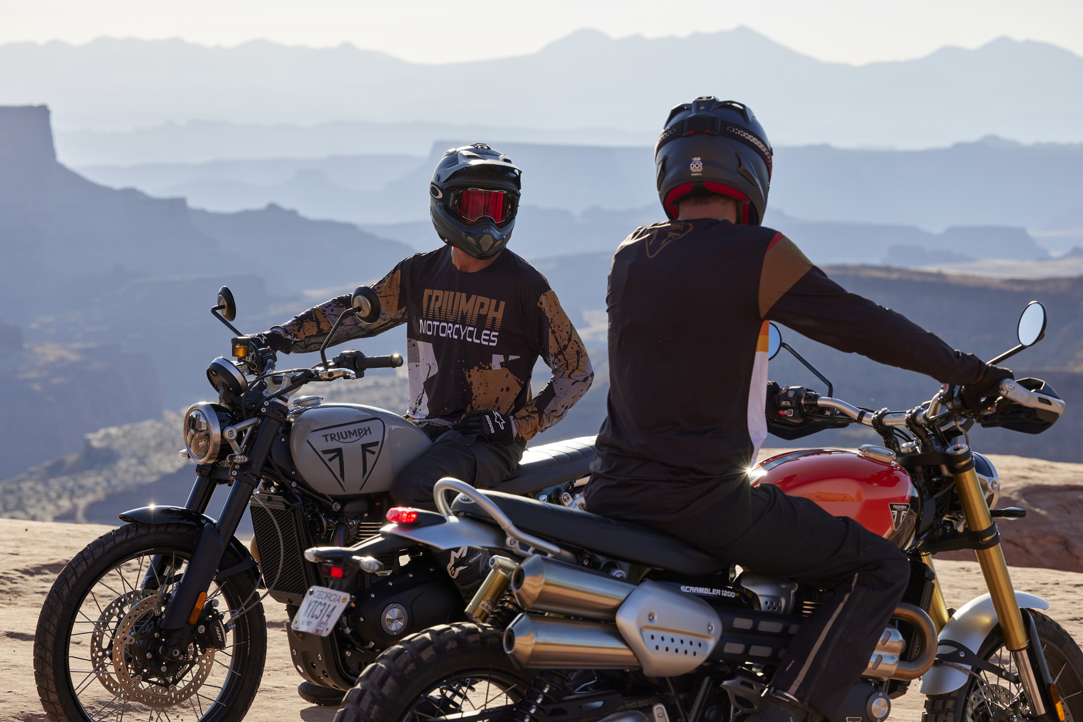 2024 Triumph Scrambler 1200 X and XE information, parked on top of a mountain