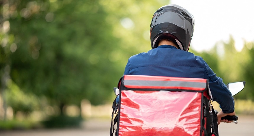 delivery rider on motorbike